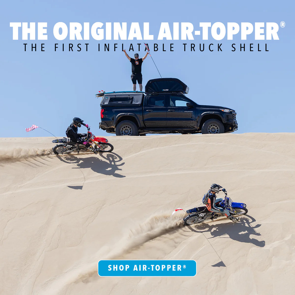 Two people on dirt bikes in sand dunes and ute with inflatable canopy and words 'The Original Air-Topper'.
