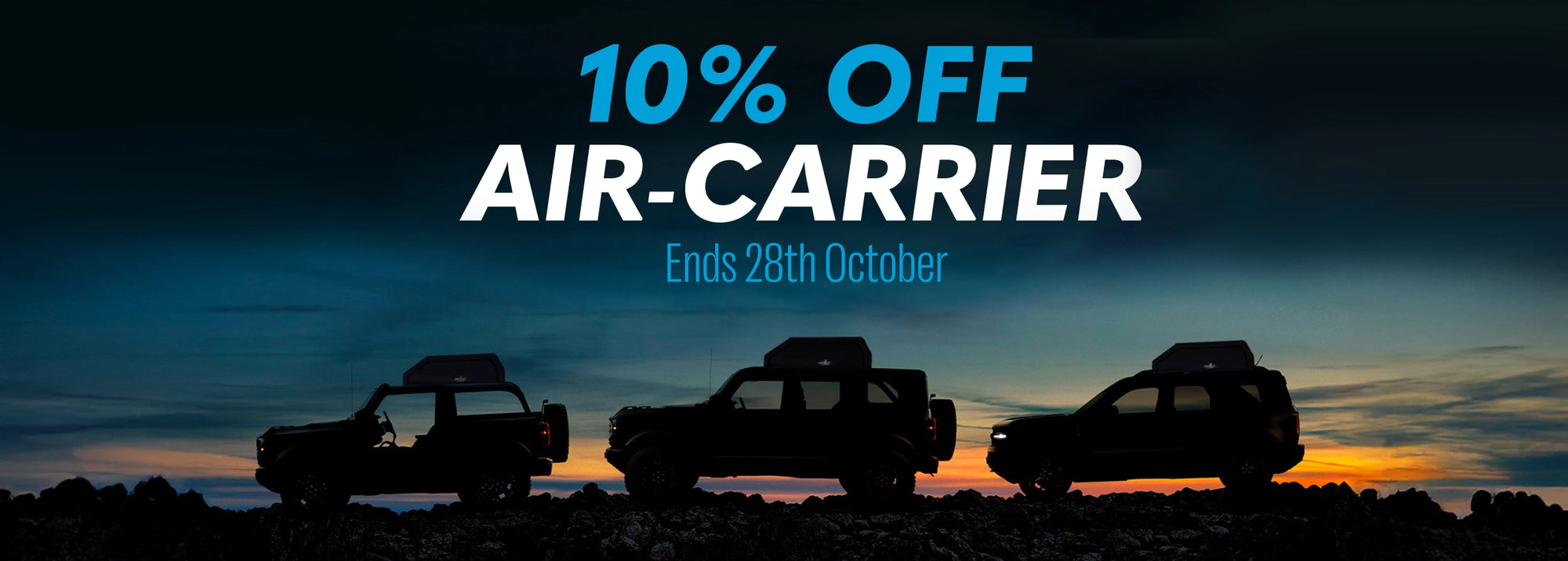 Promotional banner with silhouettes of vehicles against a sunset sky, offering 10% off on air-carriers with a deadline.